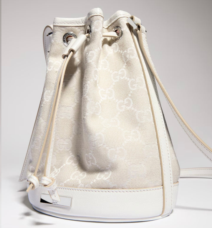 GUCCI MINI BUCKET BAG IN GG PLAQUE