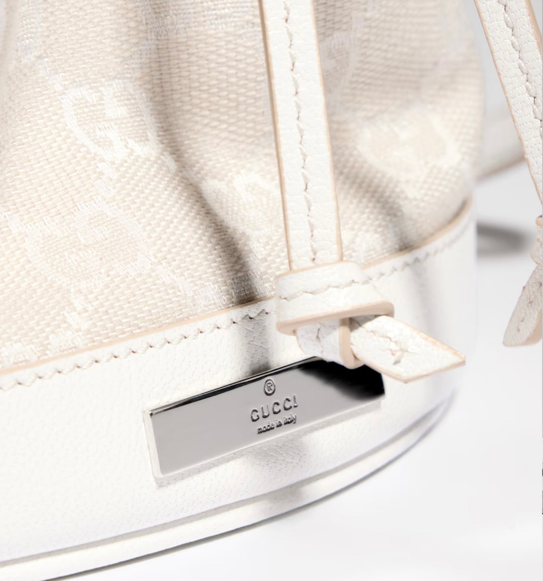 GUCCI MINI BUCKET BAG IN GG PLAQUE