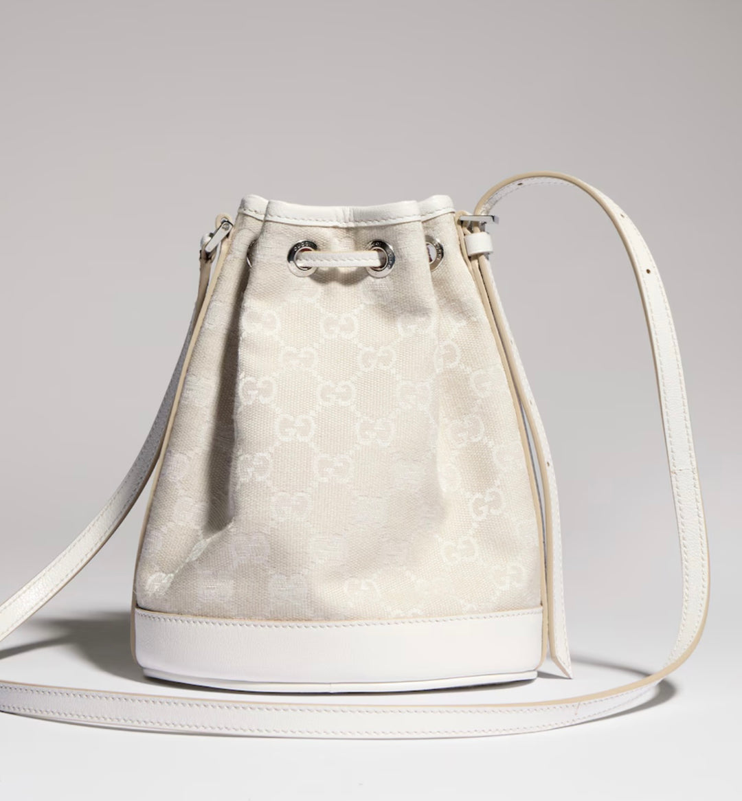 GUCCI MINI BUCKET BAG IN GG PLAQUE