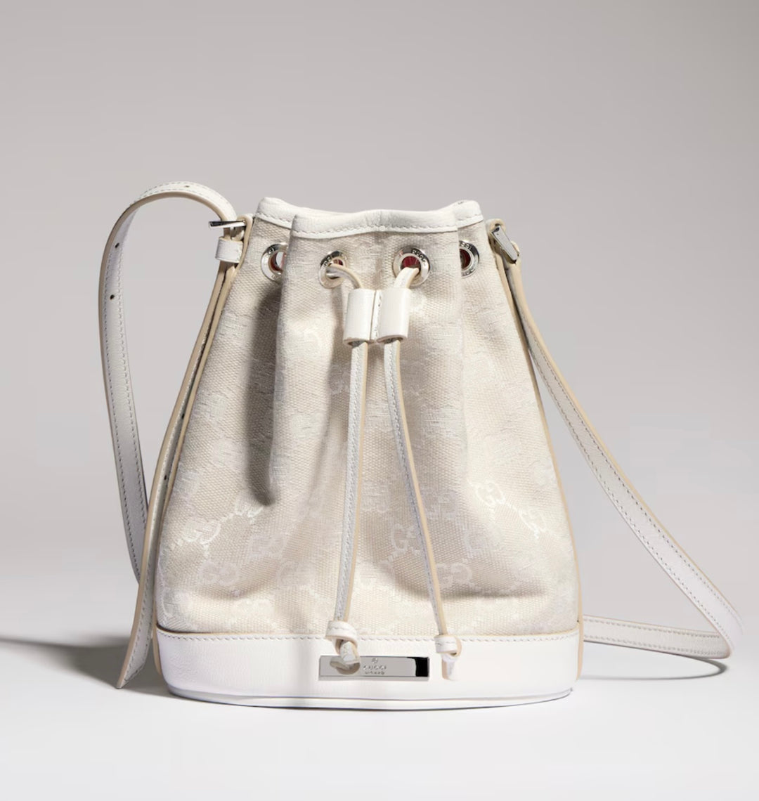 GUCCI MINI BUCKET BAG IN GG PLAQUE