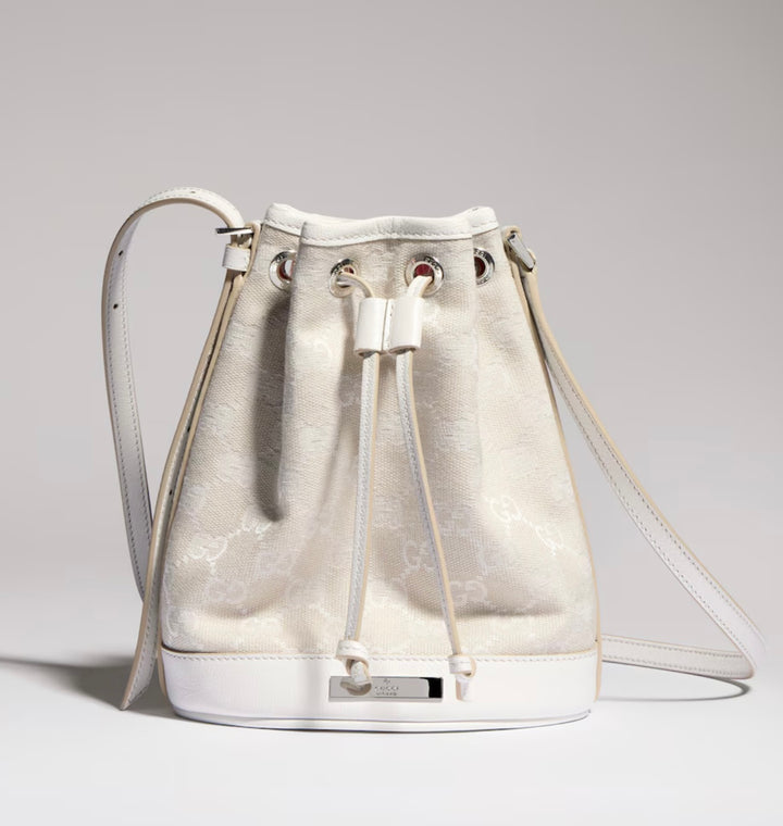 GUCCI MINI BUCKET BAG IN GG PLAQUE