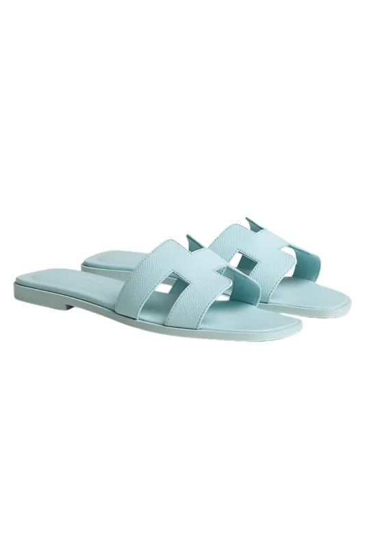 HERMES ORAN SANDALS IN BLEU BRUME