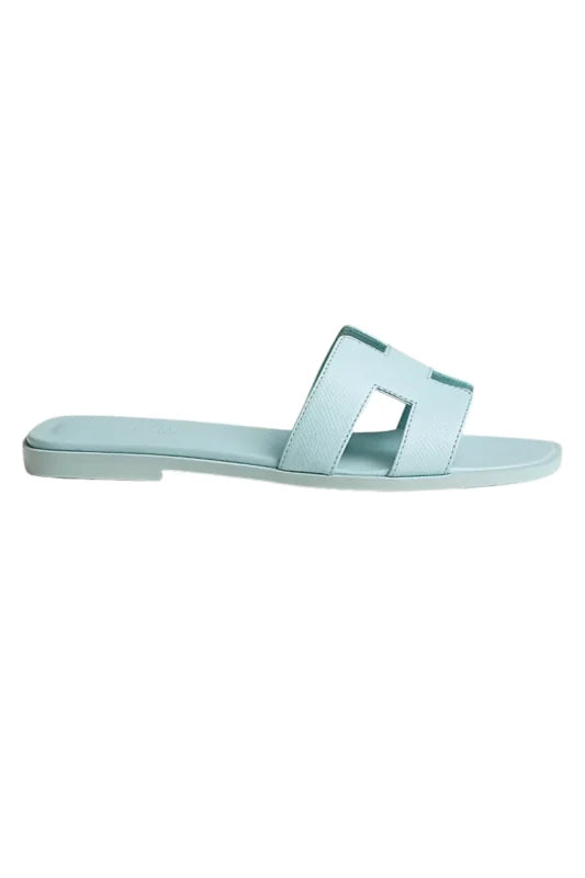 HERMES ORAN SANDALS IN BLEU BRUME