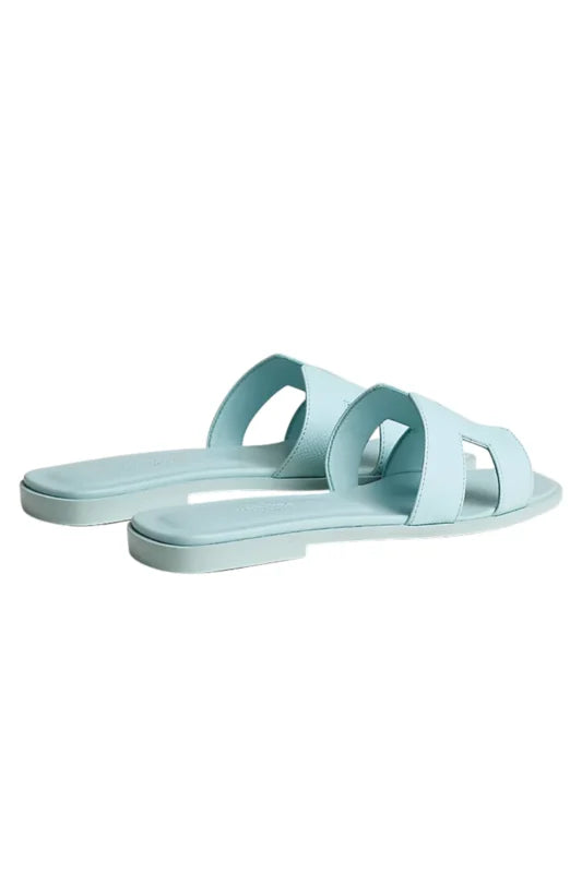 HERMES ORAN SANDALS IN BLEU BRUME
